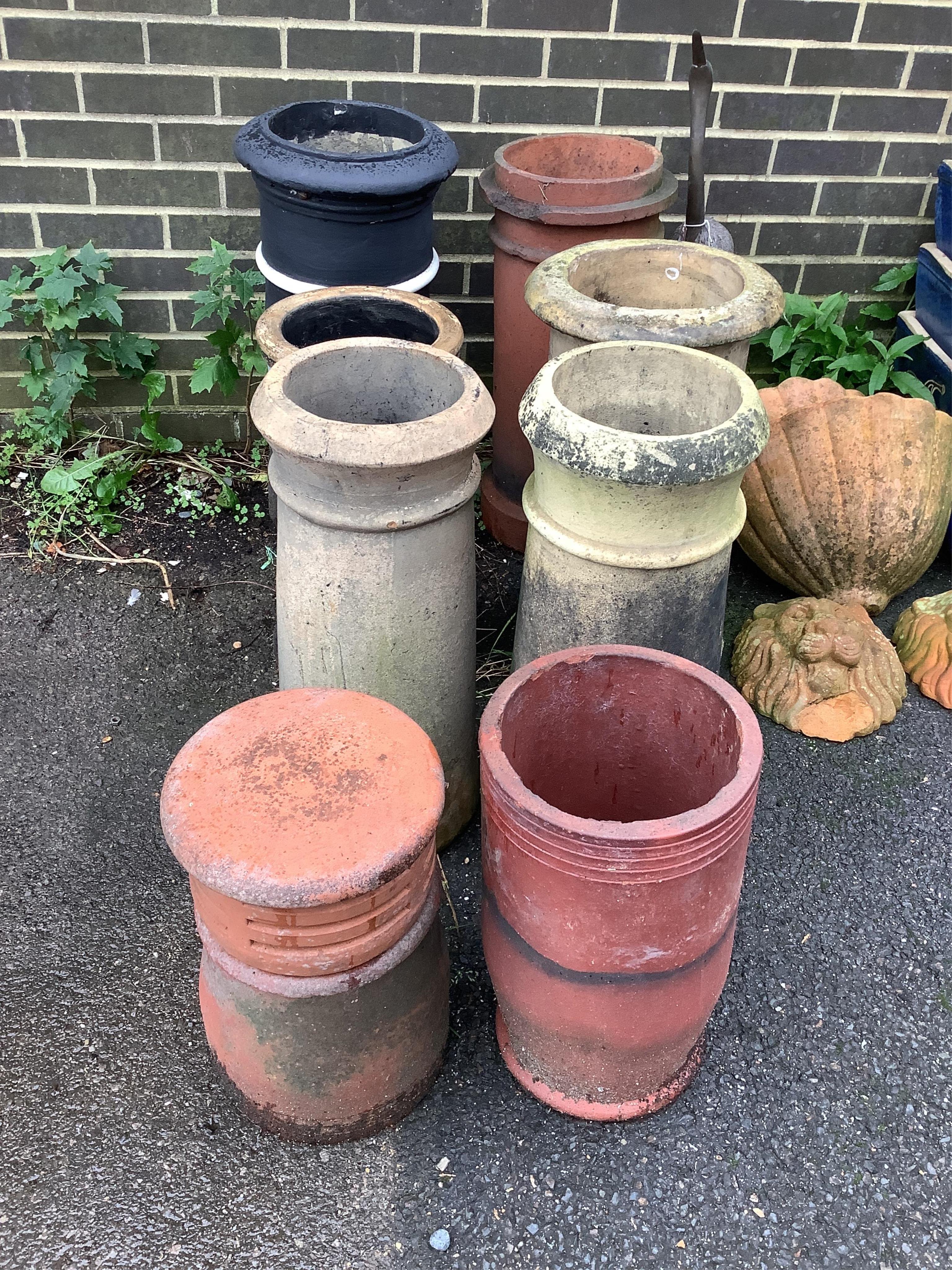 Eight assorted pottery chimney pots, largest height 70cm. Condition - all weathered, some minor chipping